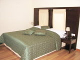 Hotel Bedroom in Dark Wood