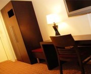 Hotel Bedroom in Dark Wood